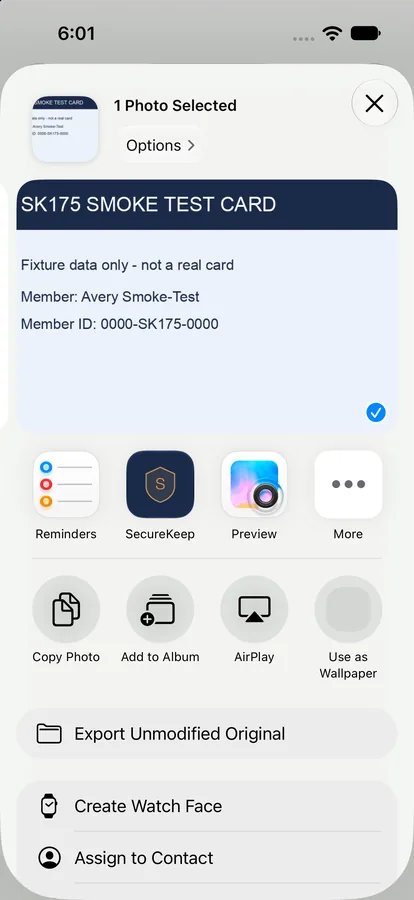 The iPhone share sheet in Photos for a made-up test card, with SecureKeep in the row of apps between Reminders and Preview