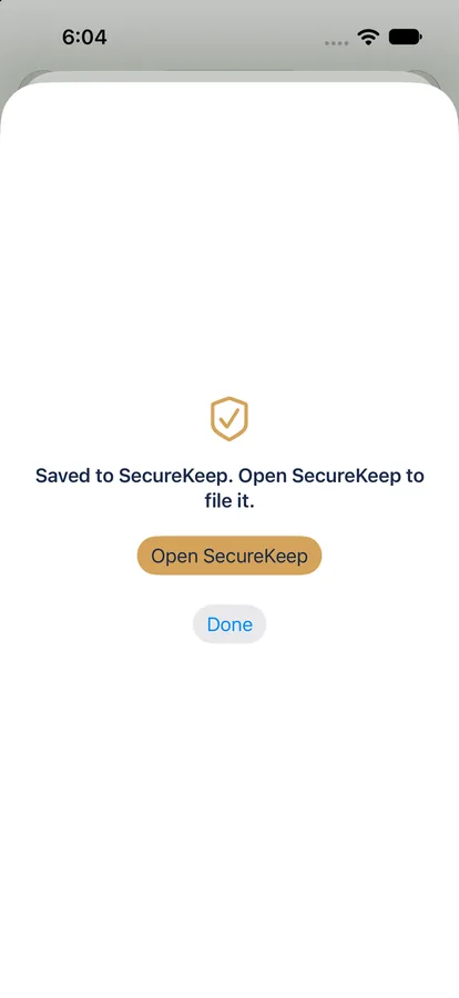 The SecureKeep sheet on iPhone saying Saved to SecureKeep. Open SecureKeep to file it, with Open SecureKeep and Done buttons